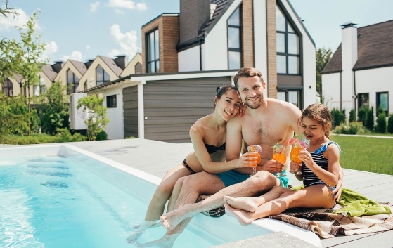 Family Enjoying Their Pool