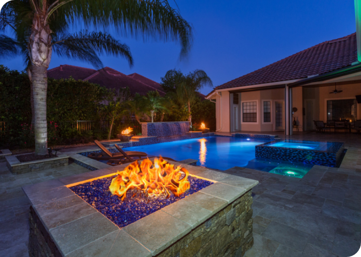 Custom firepit and pool at sunset